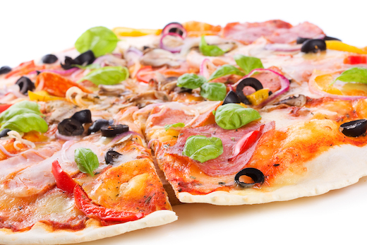pizza with ham, salami and vegetables on white background